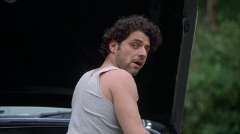 Movie still from “Lantana” (2001), directed by Ray Lawrence – A person with curly hair wearing a tank top; Close Up shot, Low angle