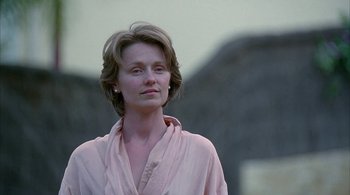 Movie still from “Lantana” (2001), directed by Ray Lawrence – A person wearing a pink shirt; Close Up shot, Low angle