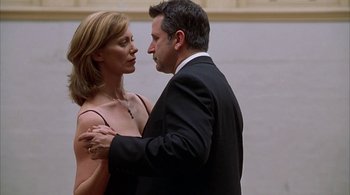 Movie still from “Lantana” (2001), directed by Ray Lawrence – A man and a woman are dancing in a room; Medium shot, Low angle