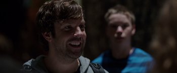Movie still from “We're the Millers” (2013), directed by Rawson Marshall Thurber – A man and a boy are smiling for the camera; Close Up shot, Over the shoulder angle