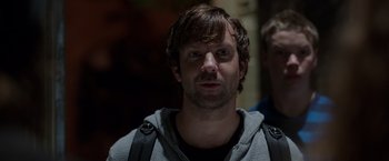 Movie still from “We're the Millers” (2013), directed by Rawson Marshall Thurber – A person wearing a hoodie; Close Up shot, Low angle