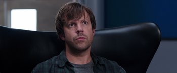 Movie still from “We're the Millers” (2013), directed by Rawson Marshall Thurber – A person sitting in a chair; Close Up shot, Over the shoulder angle