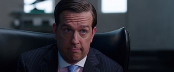 Movie still from “We're the Millers” (2013), directed by Rawson Marshall Thurber – A person wearing a suit and tie; Close Up shot, Over the shoulder angle
