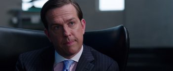 Movie still from “We're the Millers” (2013), directed by Rawson Marshall Thurber – A person wearing a suit and tie; Close Up shot, Over the shoulder angle