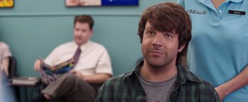 Movie still from “We're the Millers” (2013), directed by Rawson Marshall Thurber – A man in a plaid shirt is looking at the camera; Close Up shot, Over the shoulder angle