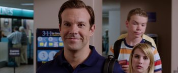 Movie still from “We're the Millers” (2013), directed by Rawson Marshall Thurber – A person wearing a blue shirt; Close Up shot, Over the shoulder angle