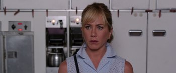 Movie still from “We're the Millers” (2013), directed by Rawson Marshall Thurber – A person in a kitchen; Close Up shot, Over the shoulder angle