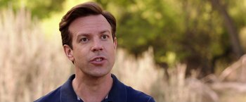 Movie still from “We're the Millers” (2013), directed by Rawson Marshall Thurber – A person wearing a blue shirt; Close Up shot, Over the shoulder angle