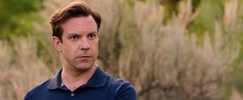 Movie still from “We're the Millers” (2013), directed by Rawson Marshall Thurber – A person wearing a polo shirt; Close Up shot, Over the shoulder angle