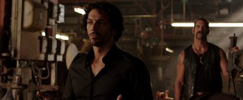 Movie still from “We're the Millers” (2013), directed by Rawson Marshall Thurber – A person wearing a black shirt; Close Up shot, Over the shoulder angle