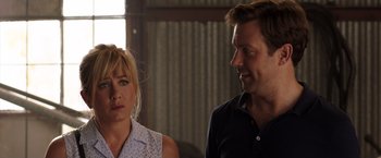 Movie still from “We're the Millers” (2013), directed by Rawson Marshall Thurber – A man and a woman standing next to each other; Close Up shot, Over the shoulder angle