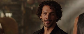 Movie still from “We're the Millers” (2013), directed by Rawson Marshall Thurber – A person with curly hair; Close Up shot, Over the shoulder angle