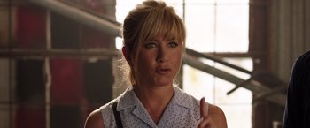 Movie still from “We're the Millers” (2013), directed by Rawson Marshall Thurber – A person wearing a white shirt; Close Up shot, Over the shoulder angle