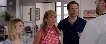 Movie still from “We're the Millers” (2013), directed by Rawson Marshall Thurber – Jennifer aniston and jason sudeikis in a scene; Medium shot, Over the shoulder angle