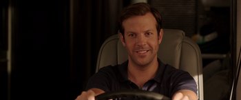 Movie still from “We're the Millers” (2013), directed by Rawson Marshall Thurber – A man sitting behind a steering wheel of a car; Close Up shot, Over the shoulder angle