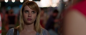 Movie still from “We're the Millers” (2013), directed by Rawson Marshall Thurber – A person wearing a blue shirt; Close Up shot, Over the shoulder angle