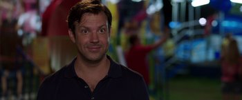 Movie still from “We're the Millers” (2013), directed by Rawson Marshall Thurber – A person wearing a polo shirt; Close Up shot, Over the shoulder angle