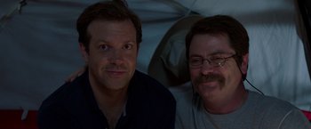 Movie still from “We're the Millers” (2013), directed by Rawson Marshall Thurber – Two men sitting next to each other in front of a window; Close Up shot, High angle