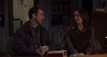 Movie still from “Lars and the Real Girl” (2007), directed by Craig Gillespie – A man and a woman sitting next to each other in a room; Medium shot, Over the shoulder angle