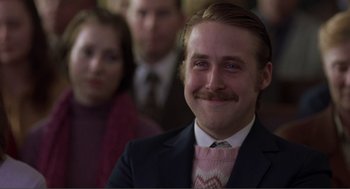 Movie still from “Lars and the Real Girl” (2007), directed by Craig Gillespie – A person wearing a suit and tie; Close Up shot, Low angle