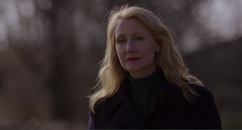 Movie still from “Lars and the Real Girl” (2007), directed by Craig Gillespie – A woman with blonde hair wearing a black jacket; Close Up shot, Over the shoulder angle