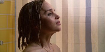 Movie still from “Last Christmas” (2019), directed by Paul Feig – A beautiful woman with wet hair in the shower; Close Up shot, High angle