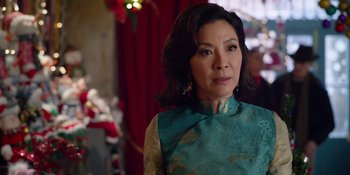 Movie still from “Last Christmas” (2019), directed by Paul Feig – A person wearing a dress; Close Up shot, Over the shoulder angle