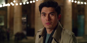 Movie still from “Last Christmas” (2019), directed by Paul Feig – A person wearing a jacket; Close Up shot, Over the shoulder angle