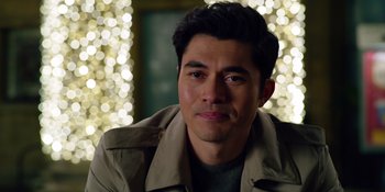 Movie still from “Last Christmas” (2019), directed by Paul Feig – A person wearing a jacket; Close Up shot, Over the shoulder angle