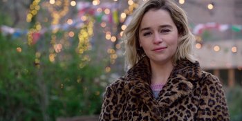 Movie still from “Last Christmas” (2019), directed by Paul Feig – A person wearing a coat; Close Up shot, Over the shoulder angle