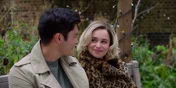 Movie still from “Last Christmas” (2019), directed by Paul Feig – A man and a woman sitting next to each other; Close Up shot, Over the shoulder angle