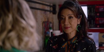 Movie still from “Last Christmas” (2019), directed by Paul Feig – A person wearing a dress; Close Up shot, Over the shoulder angle