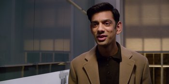 Movie still from “Last Christmas” (2019), directed by Paul Feig – A person wearing a jacket; Medium shot, Over the shoulder angle