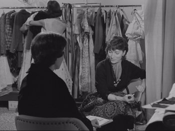 Movie still from “The Girlfriends” (1955), directed by Michelangelo Antonioni – Two women sitting on the ground in a room; Medium shot, Over the shoulder angle