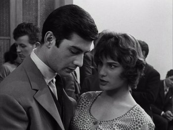 Movie still from “Le Beau Serge” (1958), directed by Claude Chabrol – A black and white photo of a man and a woman; Close Up shot, Low angle