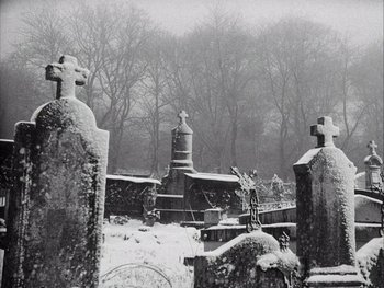 Movie still from “Le Beau Serge” (1958), directed by Claude Chabrol – An old photo of a cemetery in the snow; Extreme Wide shot, Low angle