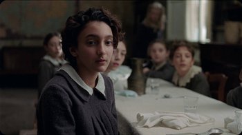 A group of people sitting at a table