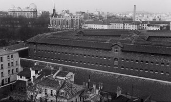 Movie still from “The Hole” (1960), directed by Jacques Becker – An aerial view of an industrial area in a city; Extreme Wide shot, High angle