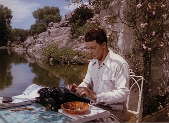 Movie still from “Leave Her to Heaven” (1945), directed by John M. Stahl – A man sitting at a table with a bowl of food; Wide shot, High angle