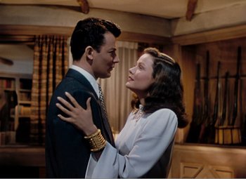 Movie still from “Leave Her to Heaven” (1945), directed by John M. Stahl – A man and a woman standing next to each other; Medium shot, High angle