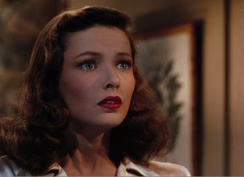 Movie still from “Leave Her to Heaven” (1945), directed by John M. Stahl – A person wearing a white shirt; Close Up shot, Low angle