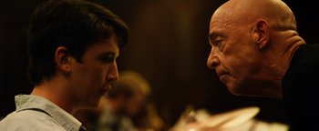 Movie still from “Whiplash” (2014), directed by Damien Chazelle – A man and a woman talking to each other; Close Up shot, Over the shoulder angle