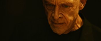 Movie still from “Whiplash” (2014), directed by Damien Chazelle – An older man with a very intense look on his face; Close Up shot, Low angle