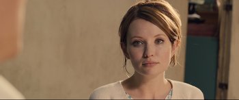 Movie still from “Legend” (2015), directed by Brian Helgeland – A person wearing a white shirt; Close Up shot, Over the shoulder angle