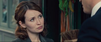 Movie still from “Legend” (2015), directed by Brian Helgeland – A person looking at the camera; Close Up shot, Over the shoulder angle