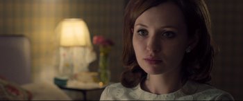 Movie still from “Legend” (2015), directed by Brian Helgeland – A person wearing a white shirt; Close Up shot, Over the shoulder angle