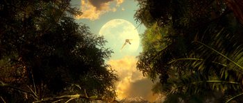 Movie still from “Legend of the Guardians: The Owls of Ga'Hoole” (2010), directed by Zack Snyder – A man flying through the air with trees in the background; Extreme Wide shot, Low angle