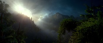 Movie still from “Legend of the Guardians: The Owls of Ga'Hoole” (2010), directed by Zack Snyder – A view of a mountain range with the sun shining on it; Extreme Wide shot, Low angle
