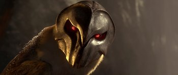 Movie still from “Legend of the Guardians: The Owls of Ga'Hoole” (2010), directed by Zack Snyder – The face of an eagle with red glowing eyes; Close Up shot, Low angle