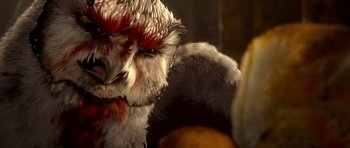 Movie still from “Legend of the Guardians: The Owls of Ga'Hoole” (2010), directed by Zack Snyder – An owl with its eyes open and its head turned to the left; Extreme Close Up shot, High angle